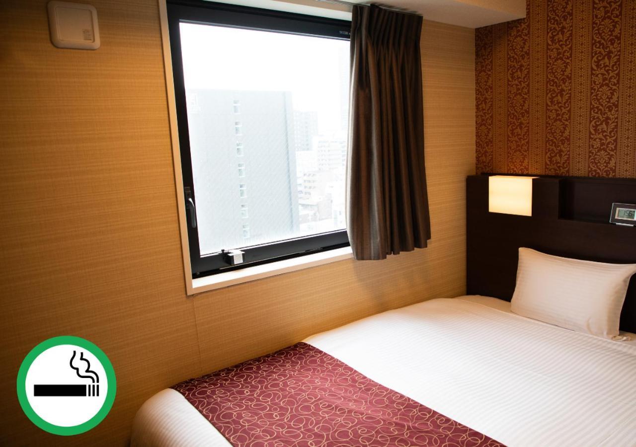 Hotel. Links Namba Ōsaka Zimmer foto